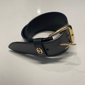 Gucci Men’s size 95 black belt with gold buckle.